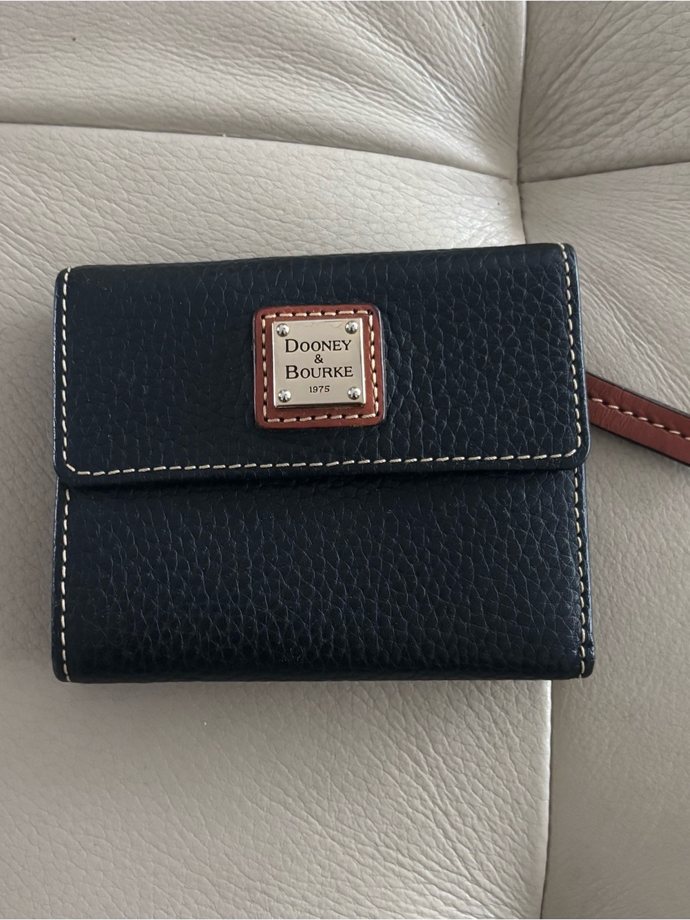 Dooney & Bourke Vintage Black Leather Wallet with red lining